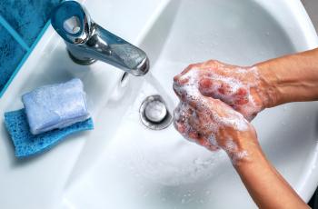 Photo of person washing hands